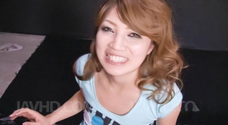 Redheaded Japanese MILF Misaki Aiba blows a couple of cocks on her knees 79016435