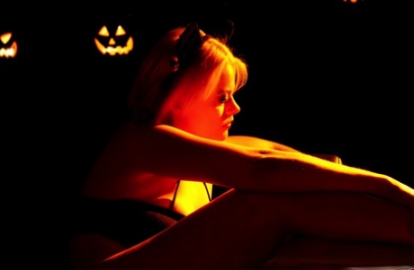 Blonde MILF Nadia White uncovers her big tits at Halloween 11673923