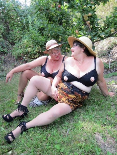 Older granny Girdle Goddess & her aged gal pal showing ass & nipples outdoors 19099832