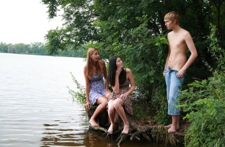 Bisexual girls have a threesome with a boy in shallow lake water 41790776