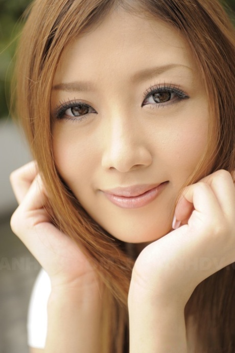 Adorable Japanese model with red hair Uta Kohaku strips to her sexy lingerie 27571453