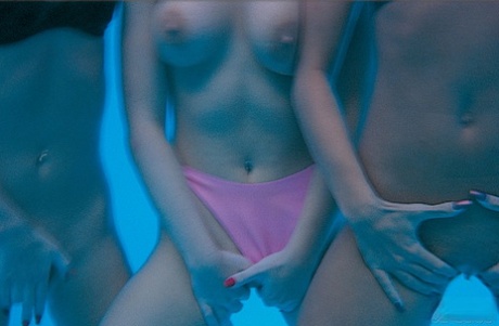 Lesbian women stack pussies on a poolside deck prior to anal dildoing action 99898965