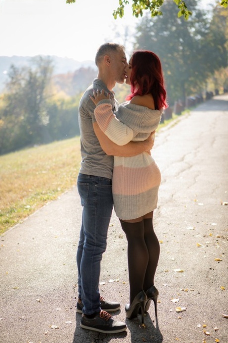 Busty redhead Kathy Fuckdoll is strip naked by a man before sexual intercourse 58138619
