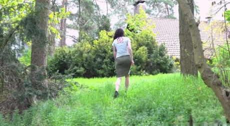 Brunette chick Ali Bordeaux gets caught taking a piss near the undergrowth 74505603