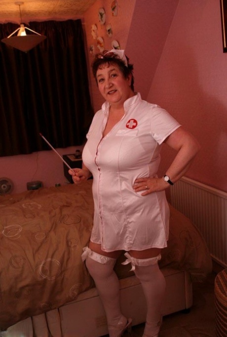 Mature amateur Kinky Carol gets on top of the man while wearing a nurse outfit 52246719