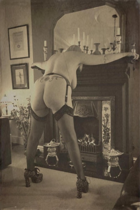 Older British lady Barby Slut gets naked in a garter belt and nylons 61646309