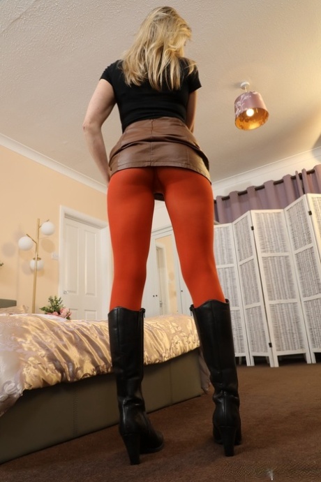 Beautiful blonde Ivy Brown goes topless while wearing orange pantyhose 86153075