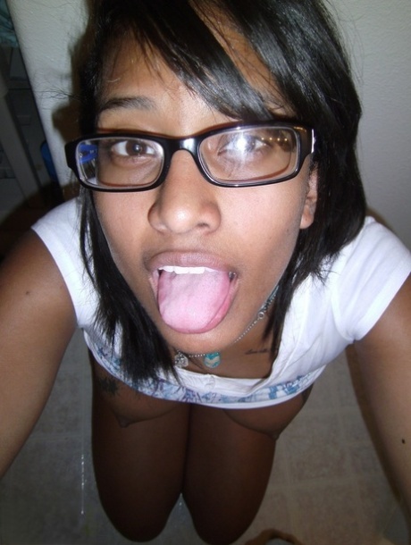 Ebony amateur uncovers her big natural tits before showing her shaved pussy 43147851
