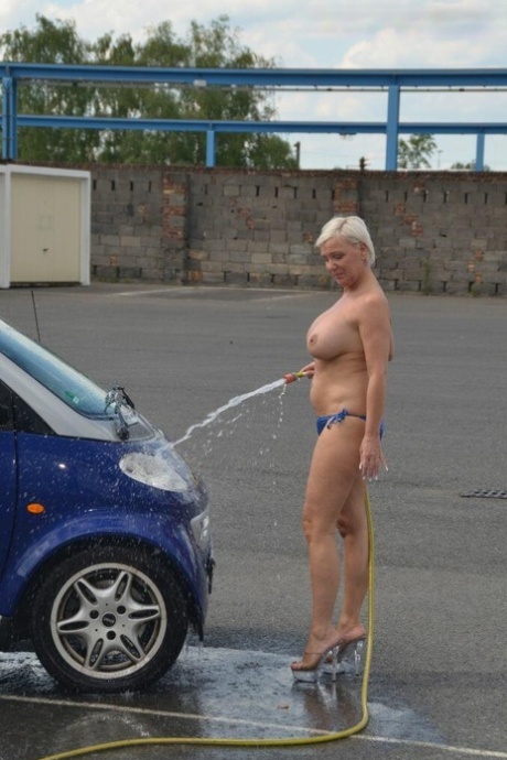 Solo lady with short blonde hair Jill Summer goes topless while washing a car 25556563