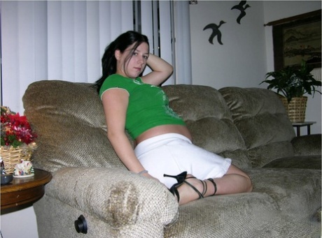 Pregnant 18 year old uncovers milk filled tits while getting totally naked 16629969