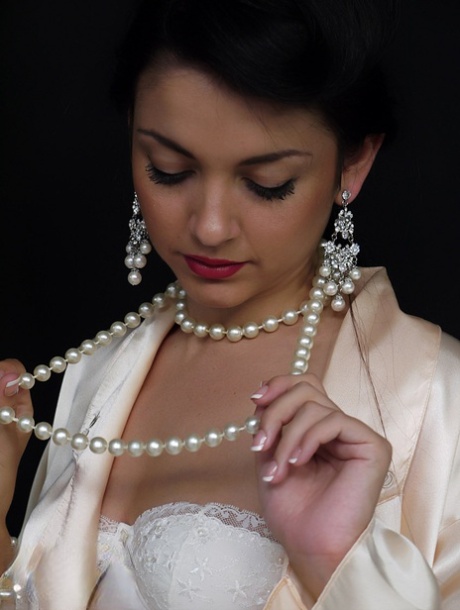 Classy lady Bryoni Kate casually releases her tits after removing her nylons 75345953