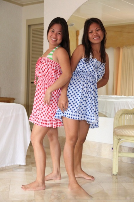 Filipina girls takes off summer dresses and underwear to stand naked together 40859241