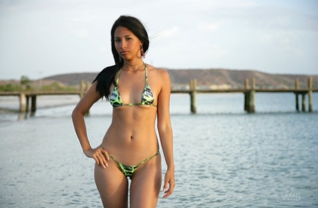 Bikini model Ruth Medina shows off her naked teen body at the beach 76870497