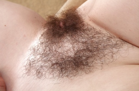Hairy mature redhead Sara spreading her wet pussy and showing off 12615078