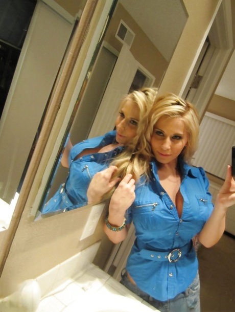 Busty blonde Madison Ivy taking mirror selfies while removing animal print bra 49477485