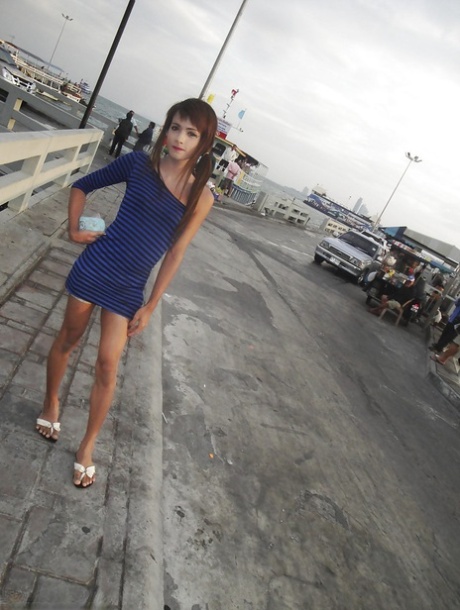 Cute teen brunette Asian tranny Un posing and showing off her long legs 75659457